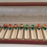 Set of 12 slip knife holders in their case
