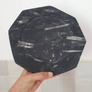 Decorative plate made of fossilised orthoceras marble.