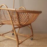 Vintage rattan cradle bassinet on wheels retro Scandinavian design baby bed