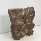 Plaster sculpture depicting a group of 3 figures