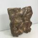 Plaster sculpture depicting a group of 3 figures