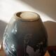 Vase noir a decor vegetal signé Philippe Jacques
