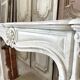 Large white marble fireplace in Louis XV style, 19th century.