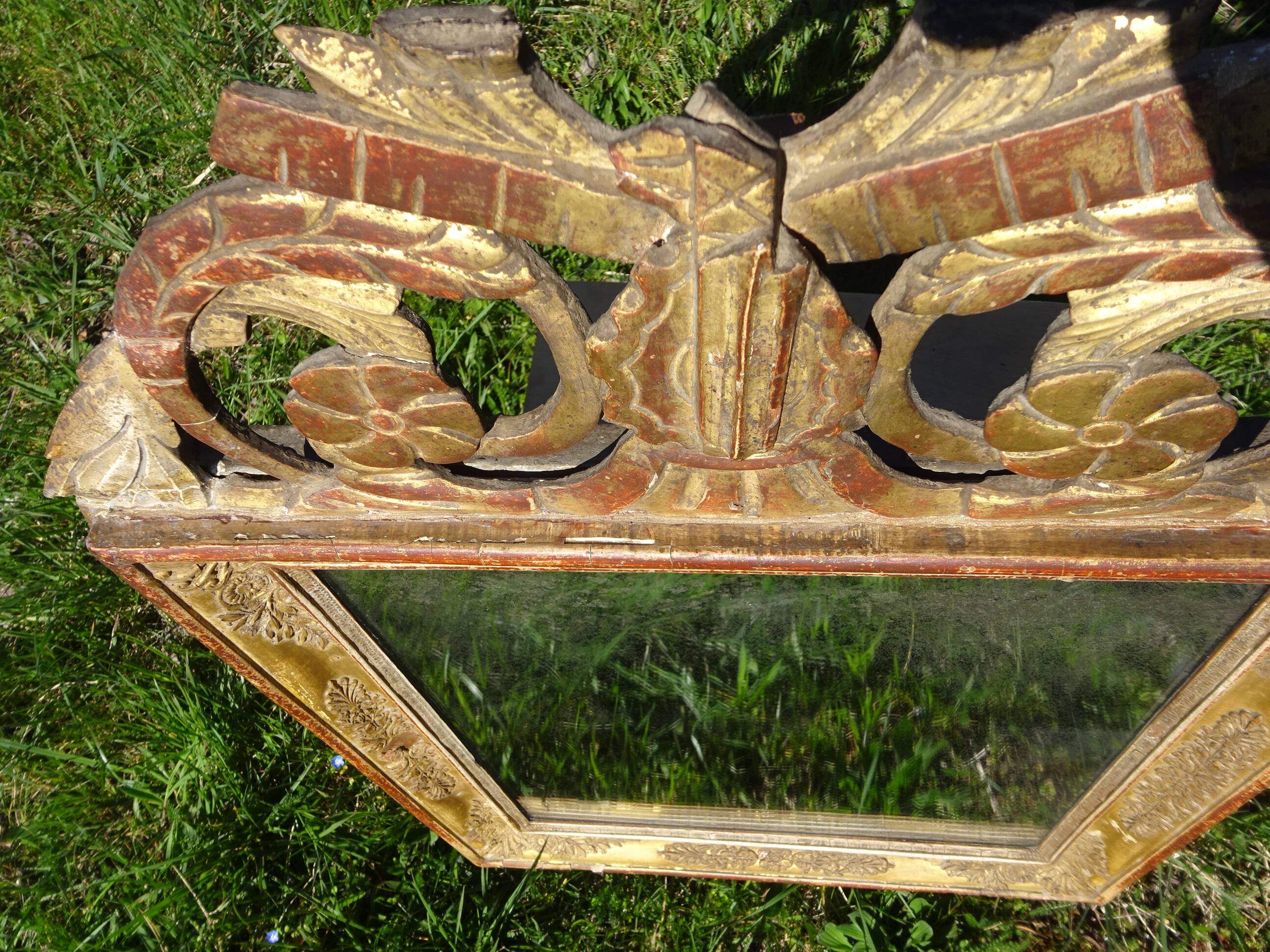 Very old Louis XVI style mirror.