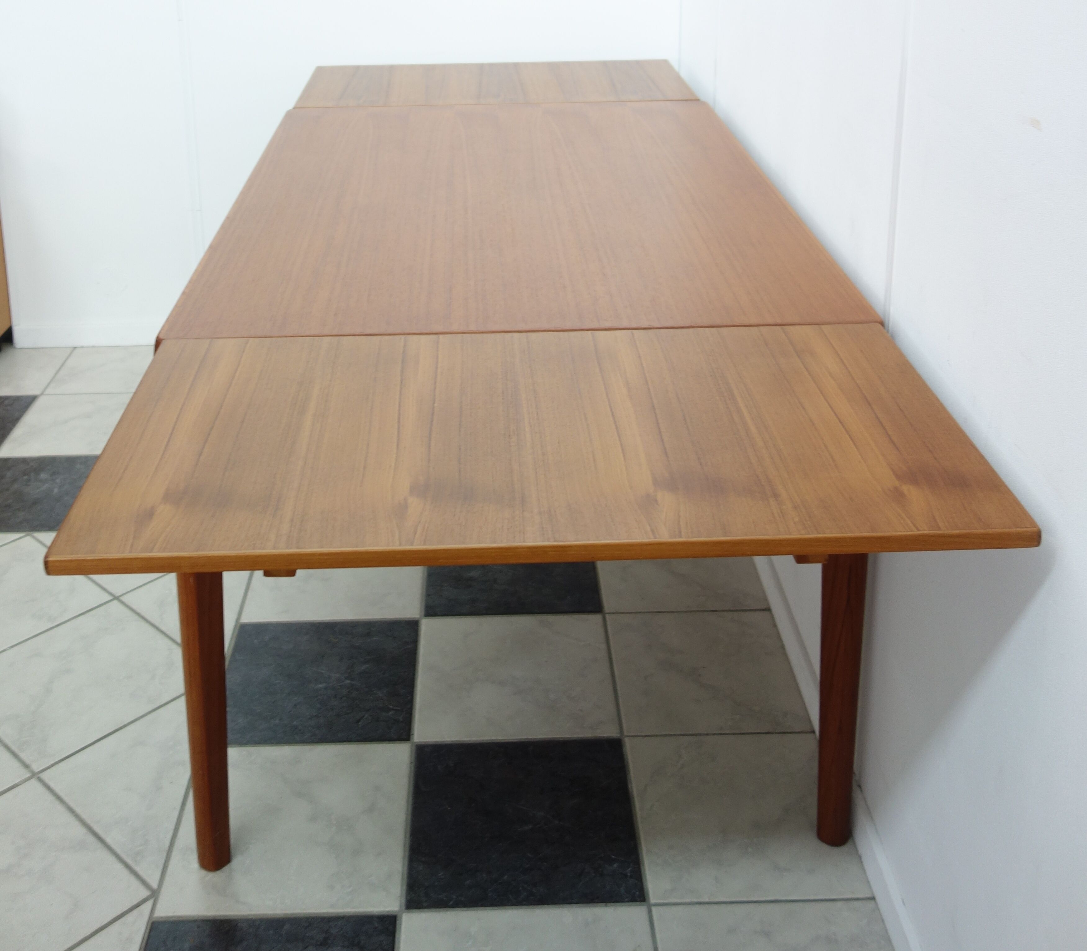 Danish teak dining table by Henning Kjaernulf 1960s