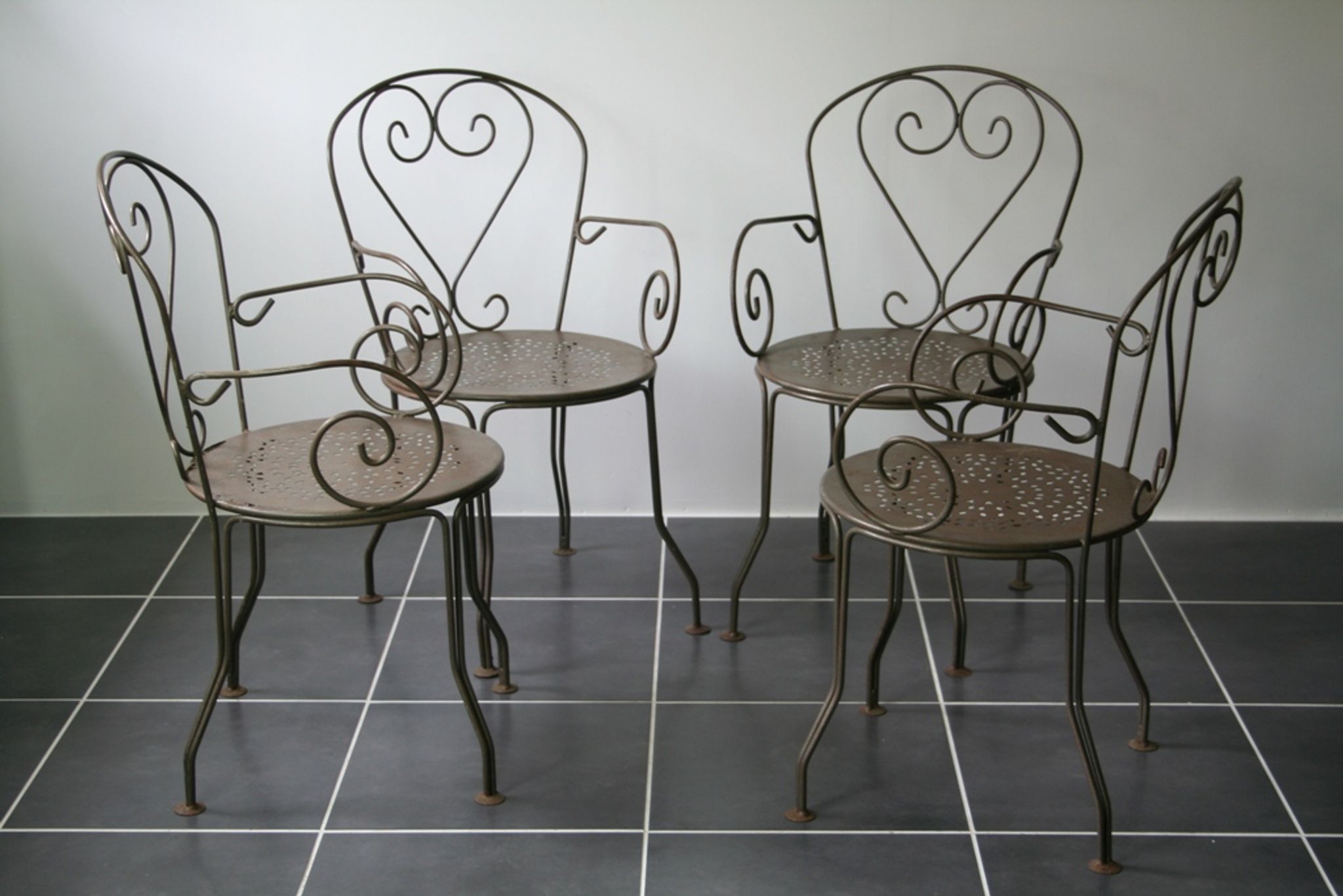 Series of 4 chairs of garden furniture wrought iron full years 60
