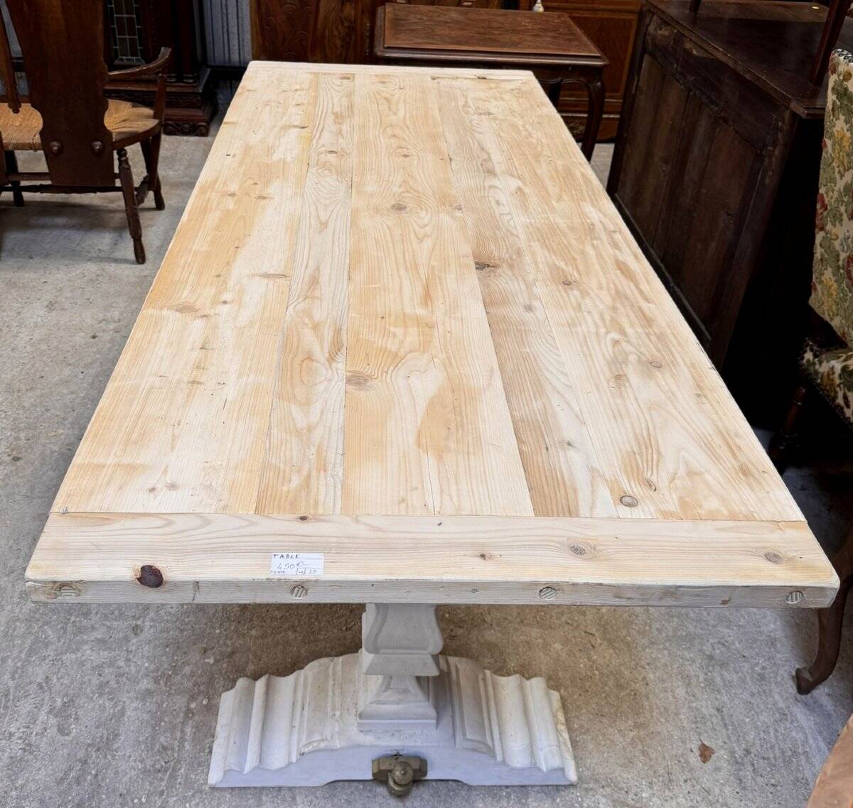 Industrial table with sandblasted top and bleached legs.