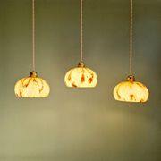 Trio of Art Deco pendant lights in marbled opaline glass, 1920s-30s