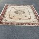 Persian rug in beige wool with woven flowers 290x190cm