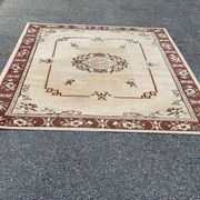 Persian rug in beige wool with woven flowers 290x190cm