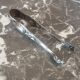 Antique silver metal sugar clamp
