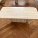 Minimalist design coffee table in unbleached travertine stone