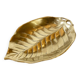 Brass pocket emptier