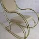 1960s rocking chair in brass and ecru imitation leather