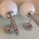 Pair of globe wall lamps in white opaline and chrome/vintage metal 70s
