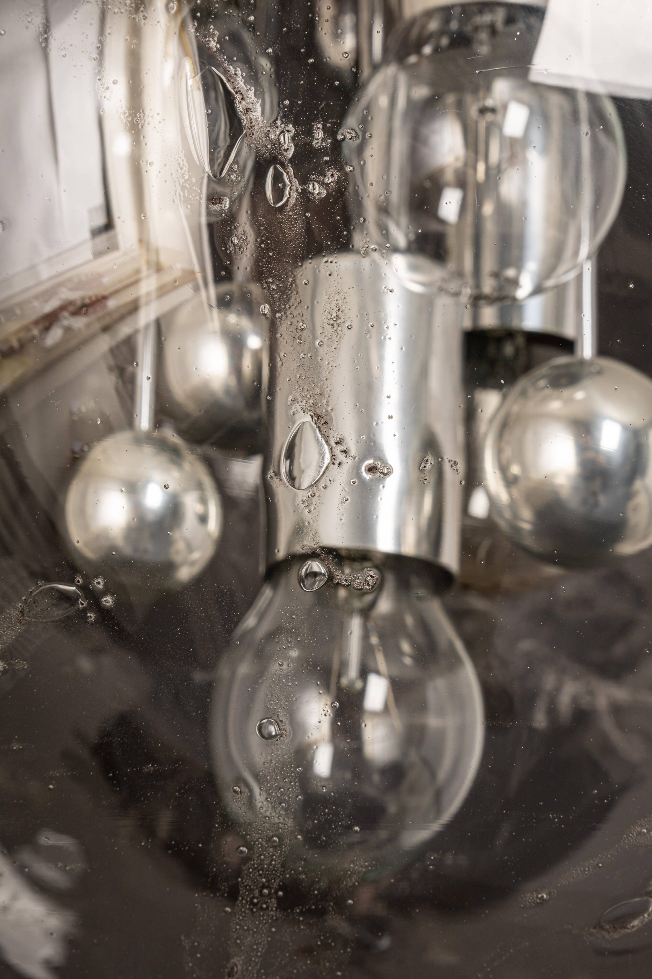 Large Sputnik ball pendant by Doria, Germany, 1970s.