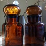 Duo of vintage apothecary bottles in amber glass