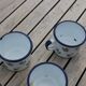 Enamelled sheet metal cups