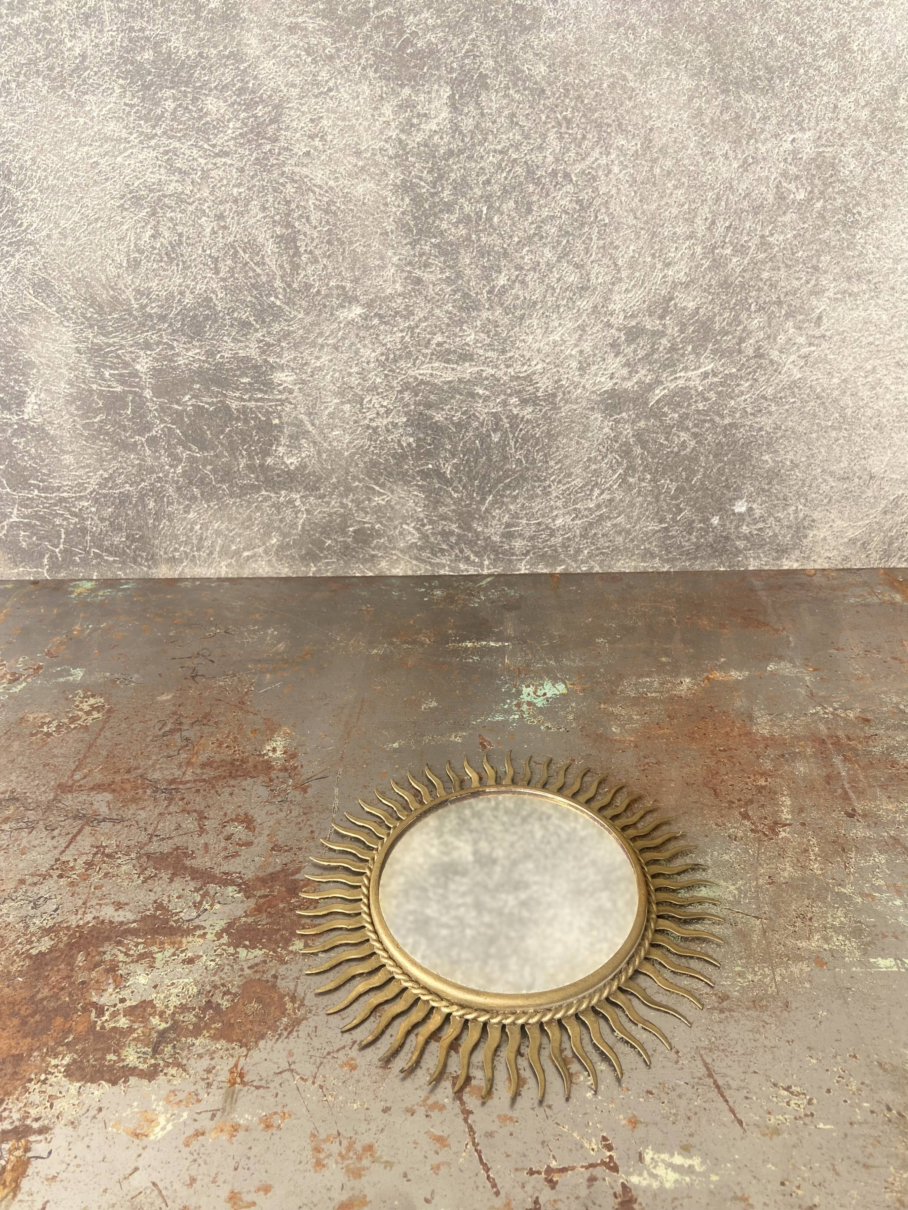 Vintage gold metal sun mirror