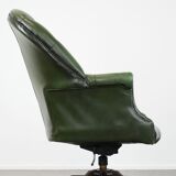 Large green cowhide Chesterfield office chair in English style on wheels