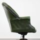 Large Chesterfield office armchair in green cowhide, in English style, on wheels.