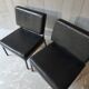 2 faux leather armchairs