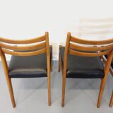 Suite of 4 scandinavian wooden chairs and skai from the 50/60s