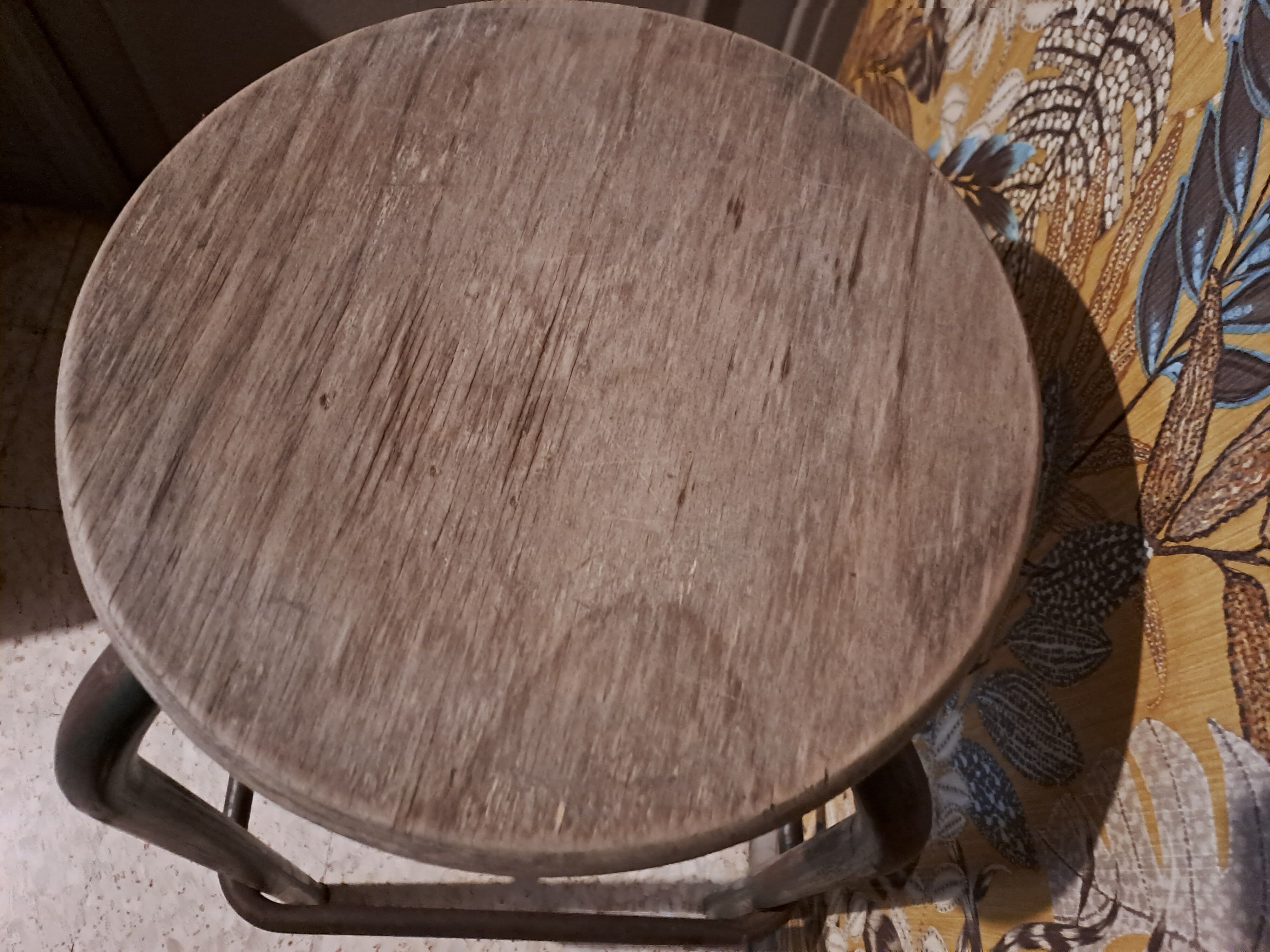 High metal stool and wooden seat Labo style dating from the 1940s industrial style