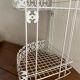 Corner shelf in openwork metal