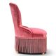 Vintage pink velvet fringed armchair