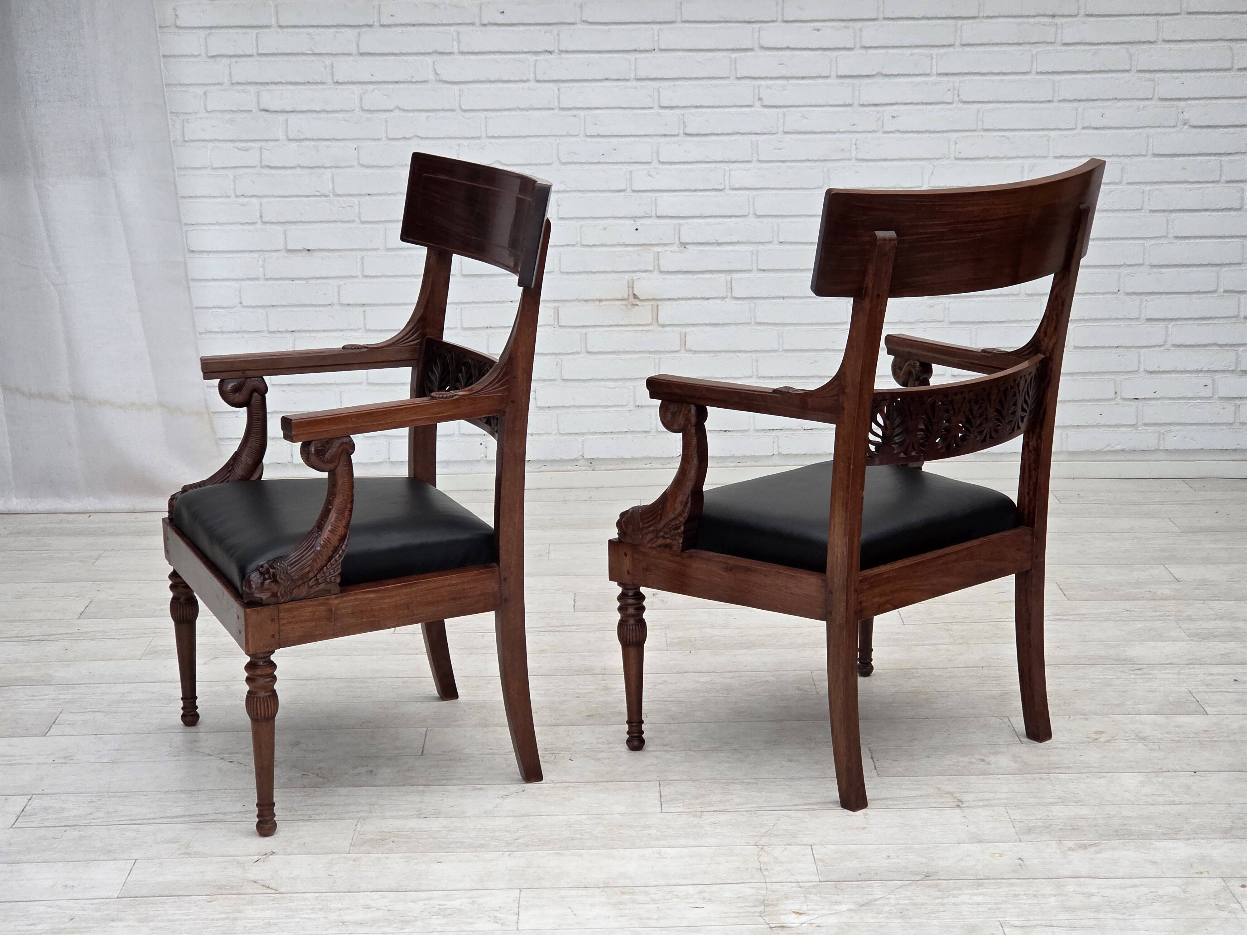 1920-30s, set of 2 armchairs, design after Georges Jacob, carved teak wood.