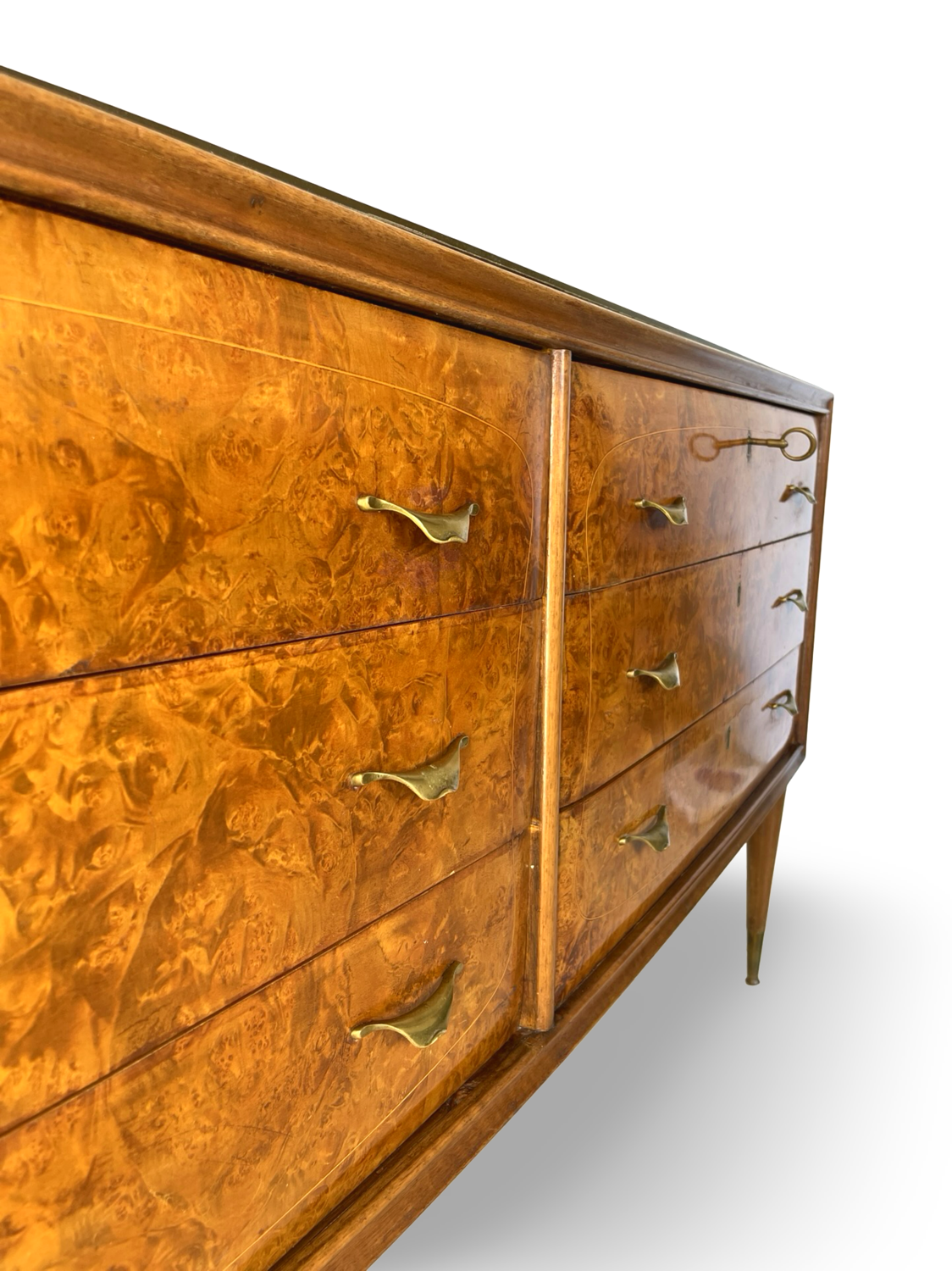 Veneered burl walnut chest of drawers with light warm brown glass top