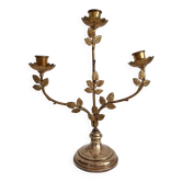 Antique bronze and brass candlestick with golden leaves