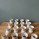 Lot de 16 coquetiers diabolo en porcelaine blanche