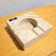 Travertine ashtray by Cerri Nestore (damaged)