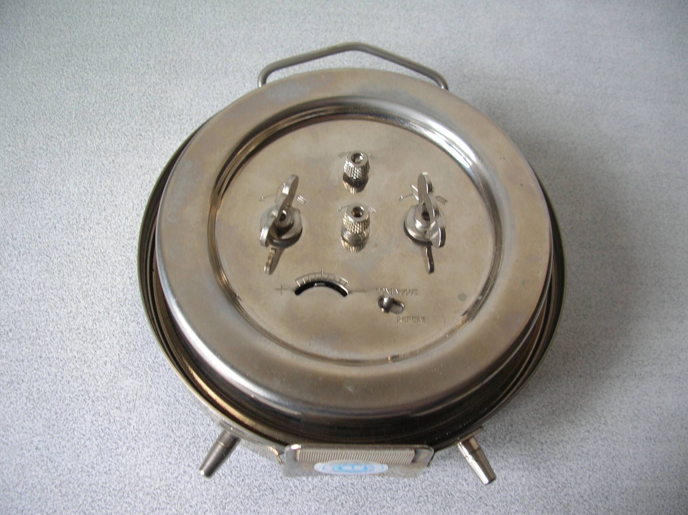 Old large mechanical alarm clock Peter Repeat Alarm chrome metal vintage retro decoration