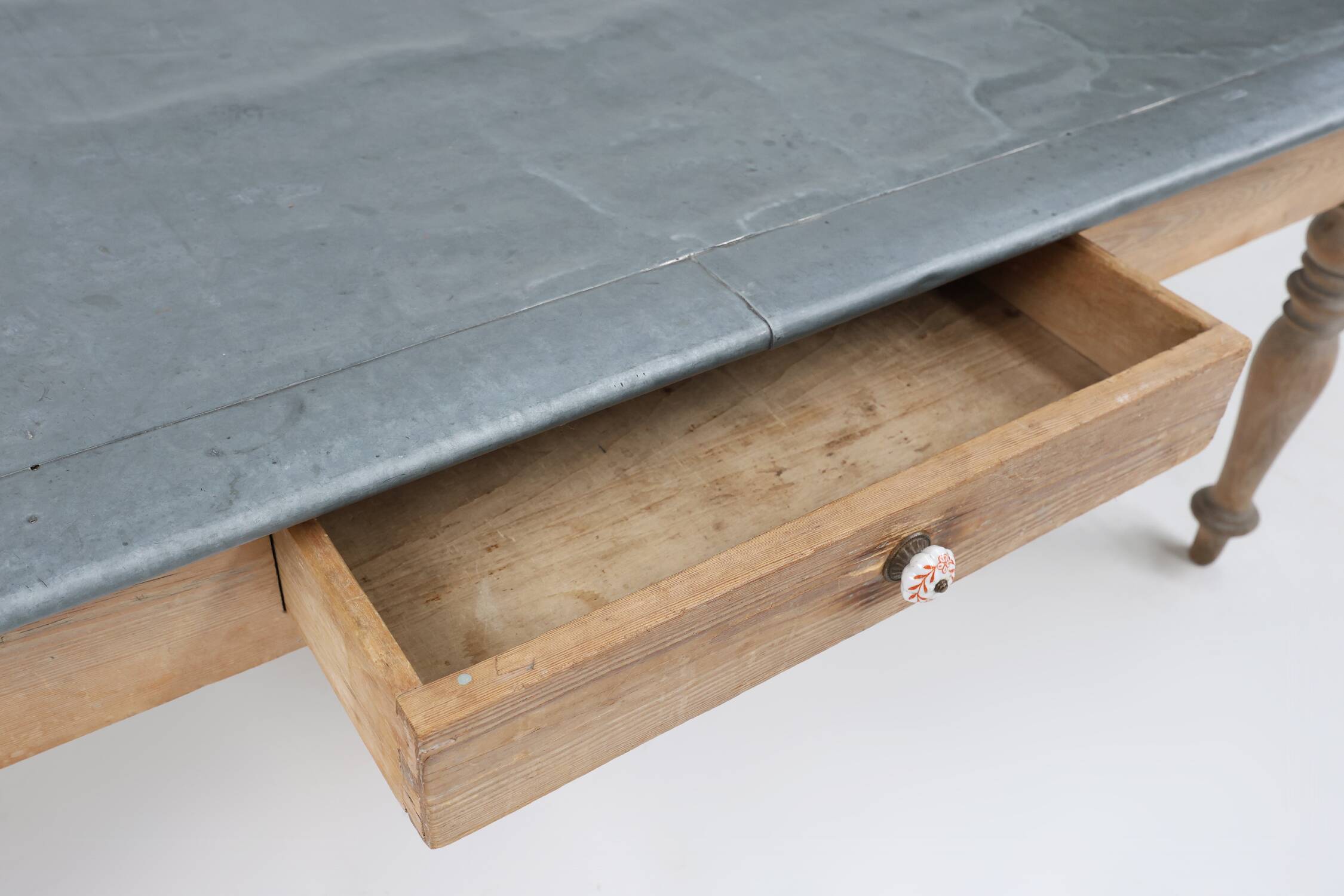 Rustic French pine wood dinner table with zinc top, ca. 1850