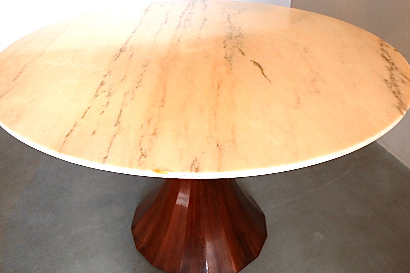 Marble and rosewood round dining table