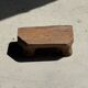Small stool, teak footrest with short cut corners.
