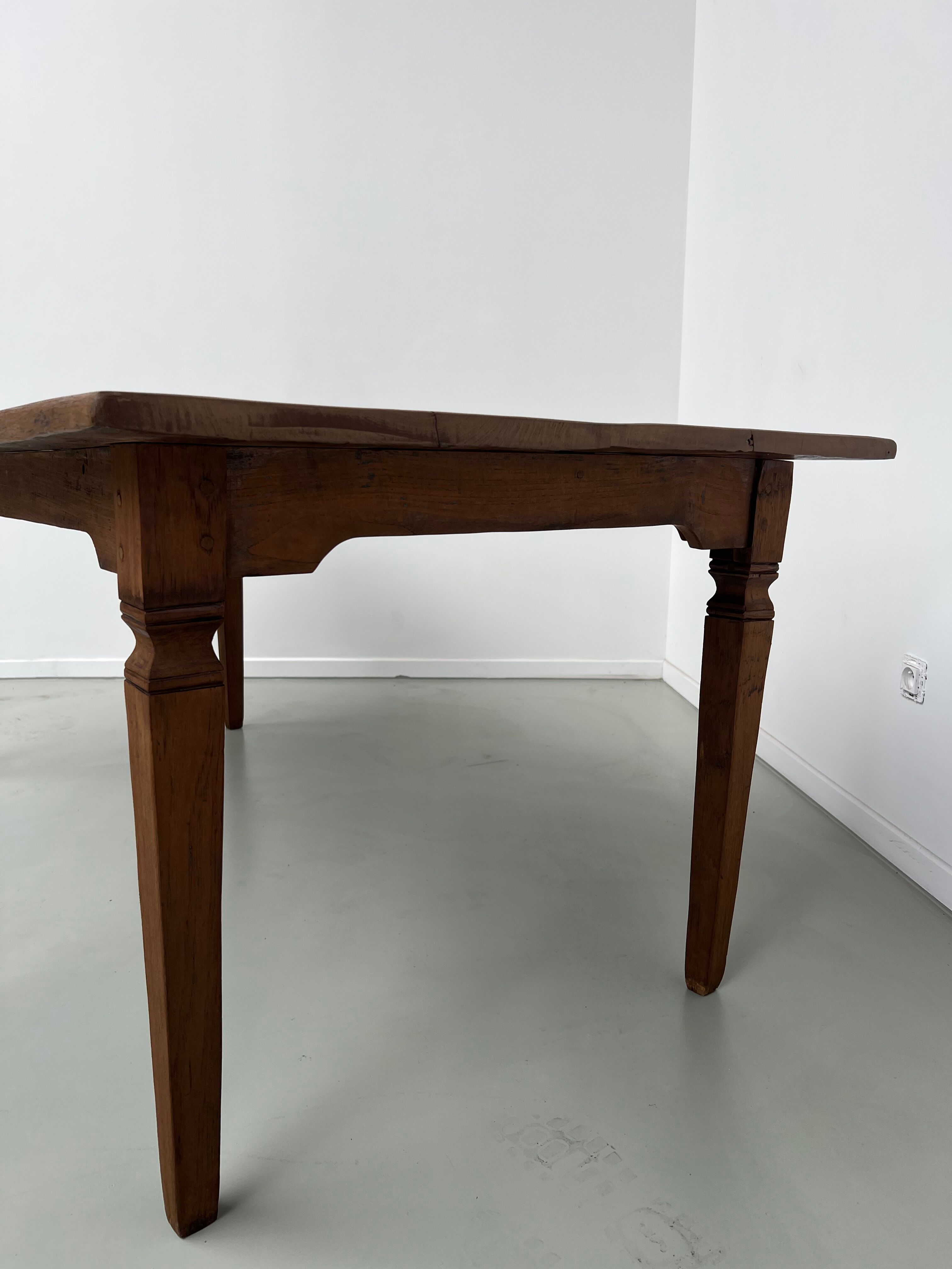Teak dining table with spindle legs, 50s