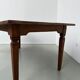 Teak dining table with spindle legs, 50s