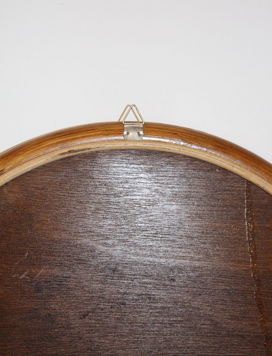 Oval bamboo mirror
