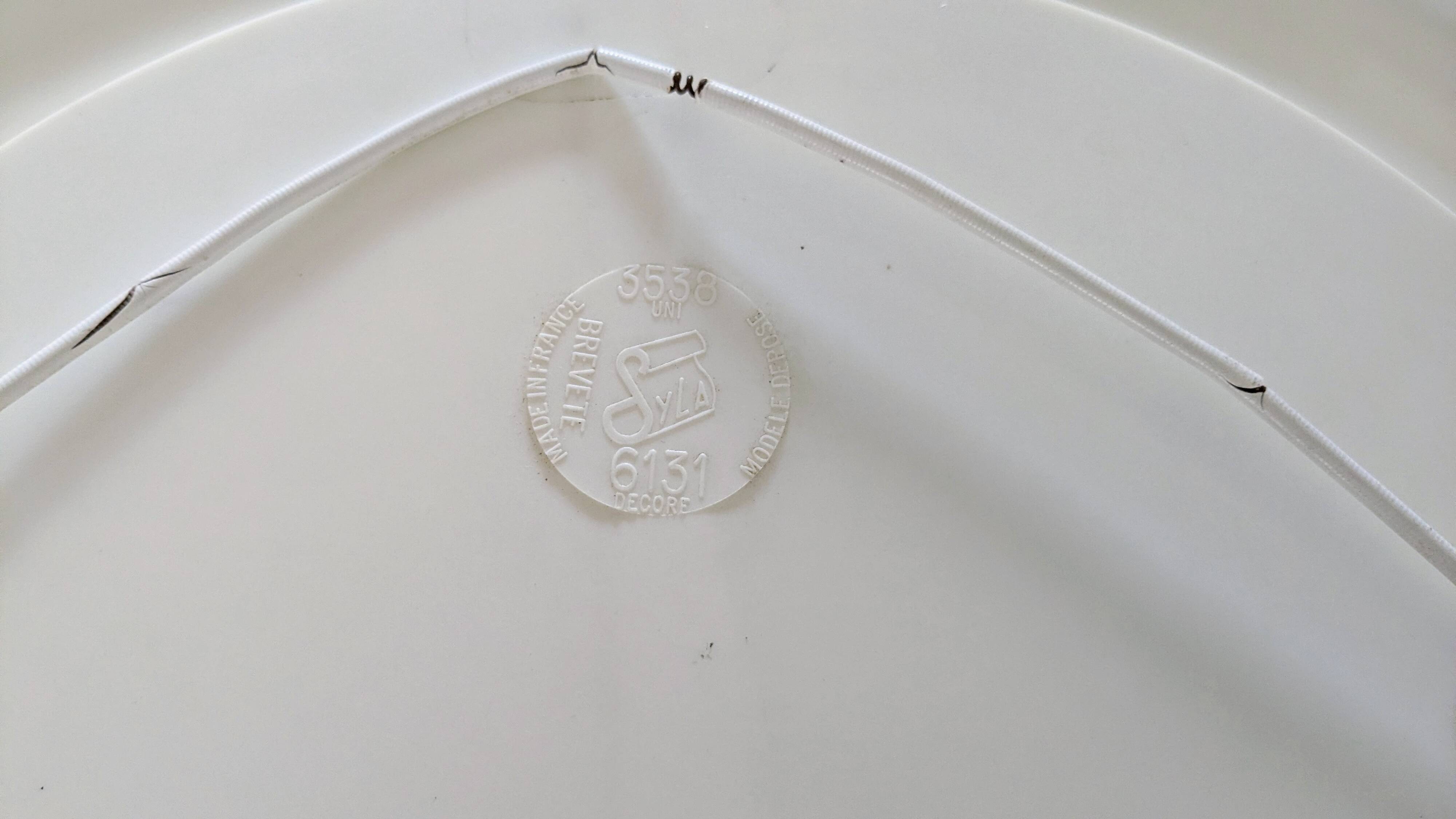 Vintage round mirror Syla model 6131 with rose decoration.