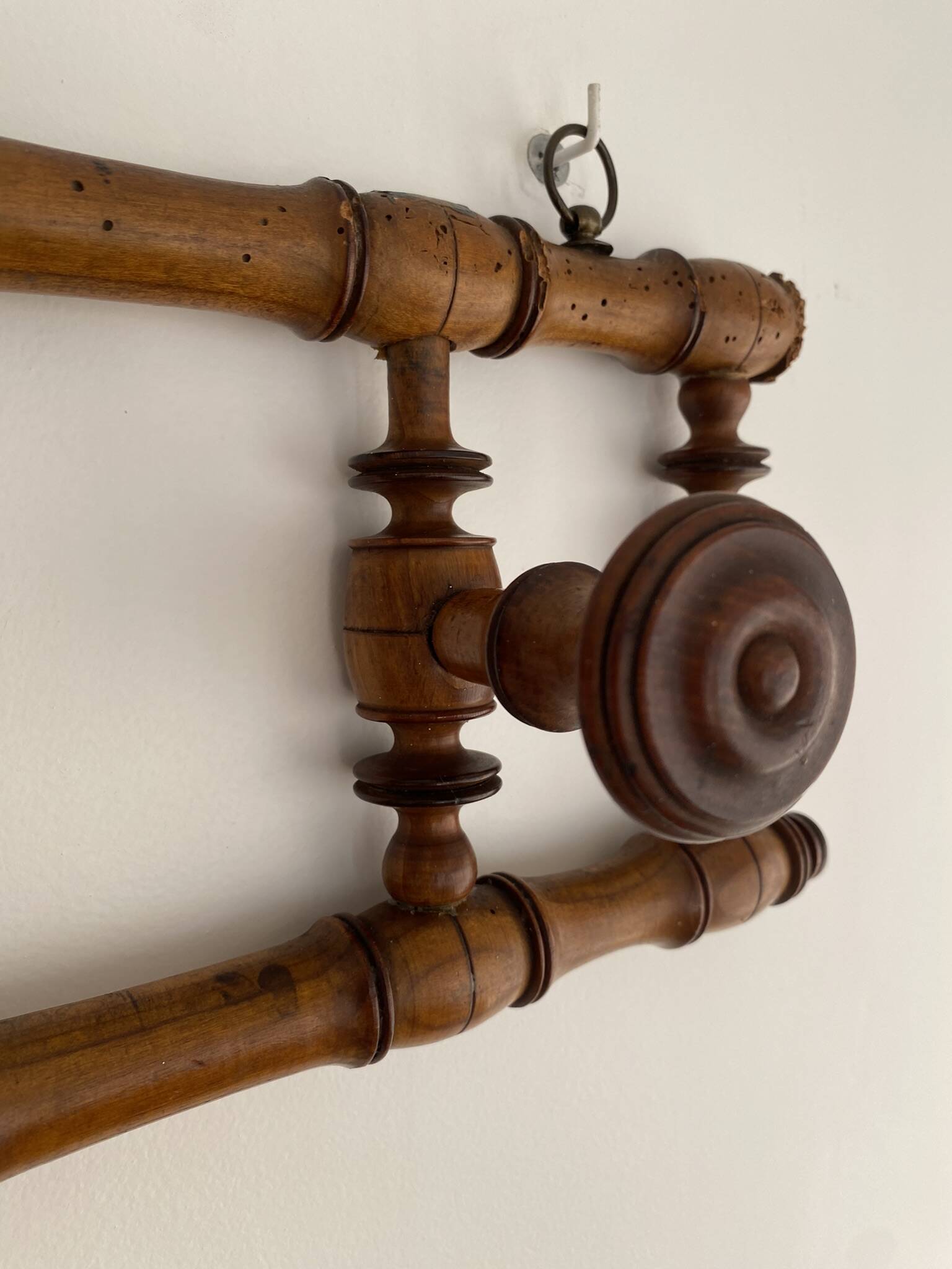 Vintage wooden wall coat rack with 4 swivel hooks from 1920