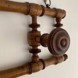 Vintage wooden wall coat rack with 4 swivel hooks from 1920