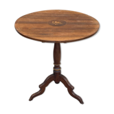 Pedestal table with tilting tray