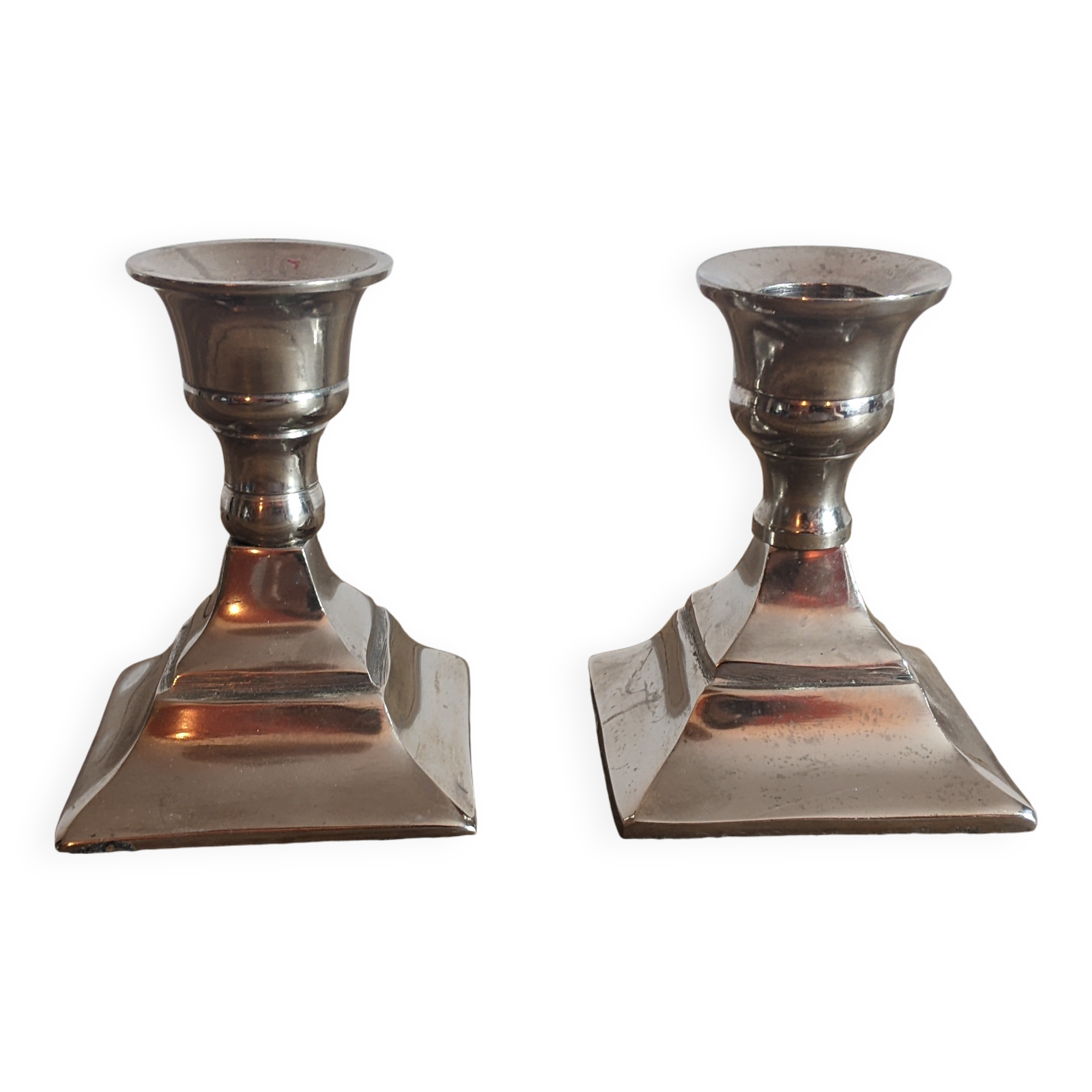 Pair of silver metal candlesticks