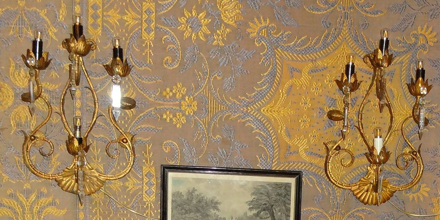 Pair of four-light gilded iron wall lamps 30 x 46 cm