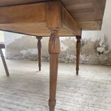 Walnut farmhouse table with swivel and extendable top