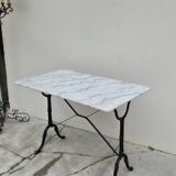 Antique marble and cast iron bistro restaurant table